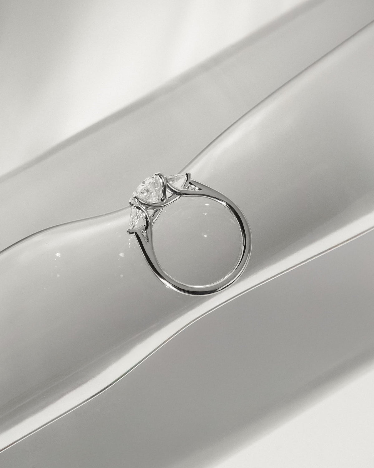 Amara - Oval Claw Trilogy with Pear Side Stones and Open Trellis Gallery Engagement Ring - Yellow Gold - yellow gold - Lara Jewels