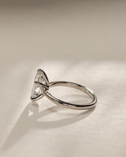 Aspen - Pear Claw Solitaire with Pinched Tapered Band and Cathedral Low Setting Engagement Ring - Yellow Gold