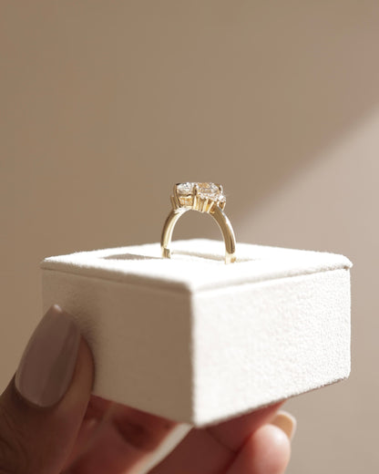 Esther - Oval Claw Solitaire with Clustered Round Opposing Shoulder Stones Engagement Ring - Yellow Gold