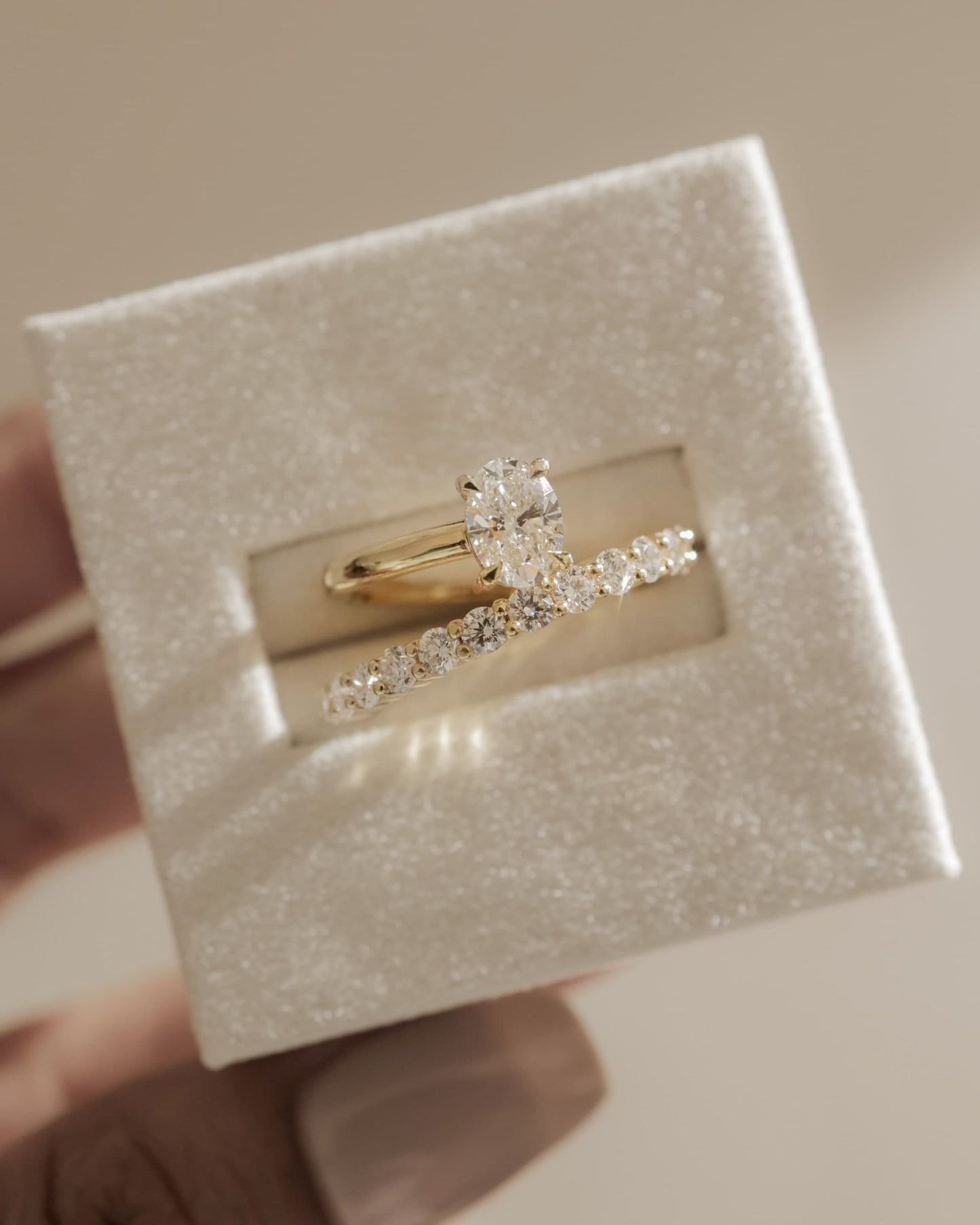 Sevela - Oval Claw Solitaire with Angled Pave Band-and-a-Half Engagement Ring - Yellow Gold