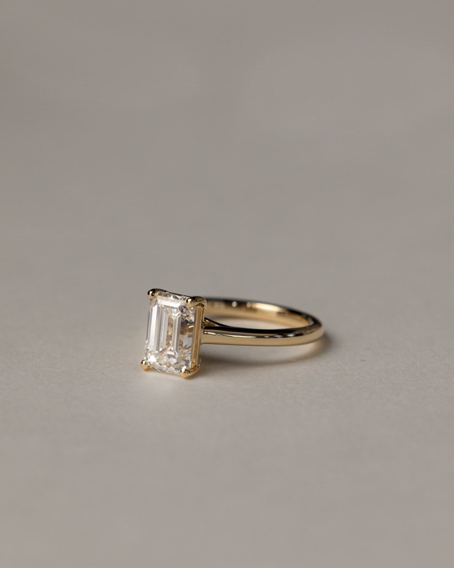 Nora - Emerald Claw Solitaire with Spiral Gallery and Cathedral Low Setting Engagement Ring - Platinum