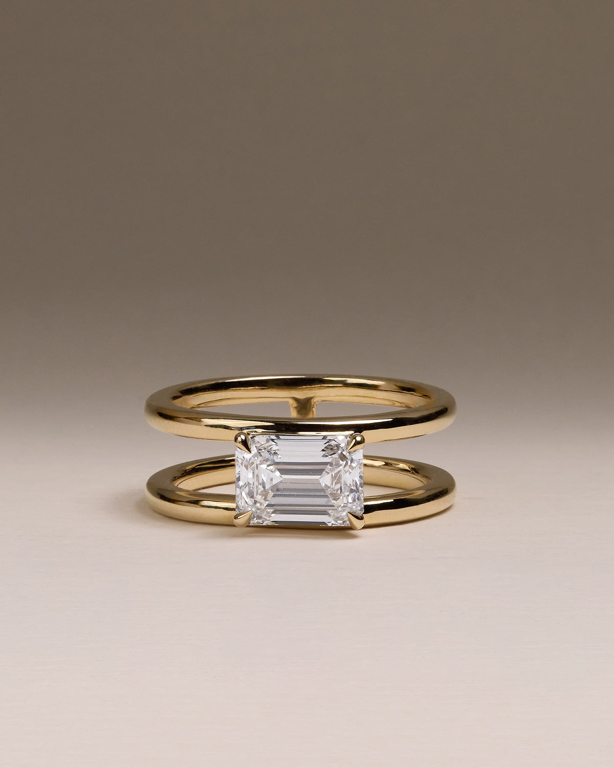 Devon - Emerald East West Claw Solitaire with Spaced Double Band Engagement Ring - Yellow Gold
