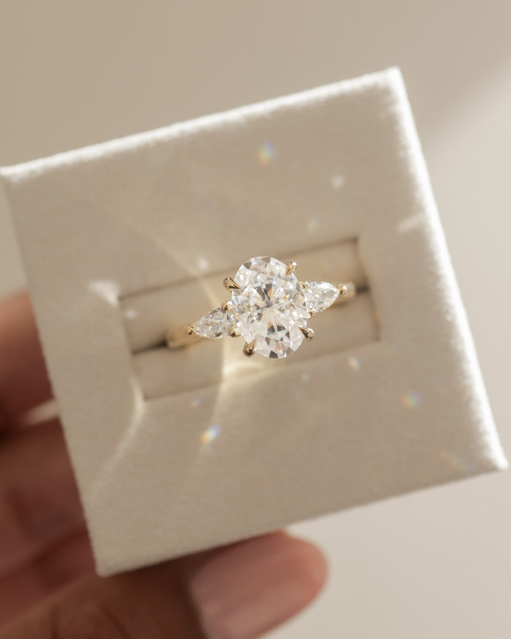 Amara - Oval Claw Trilogy with Pear Side Stones and Open Trellis Gallery Engagement Ring - Yellow Gold - yellow gold - Lara Jewels