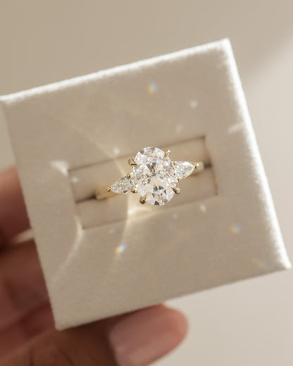 Amara - Oval Claw Trilogy with Pear Side Stones and Open Trellis Gallery Engagement Ring - Yellow Gold - yellow gold - Lara Jewels