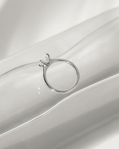 Emily - Oval Claw Solitaire with Pinched Tapered Band and Cathedral Low Setting Engagement Ring - Yellow Gold