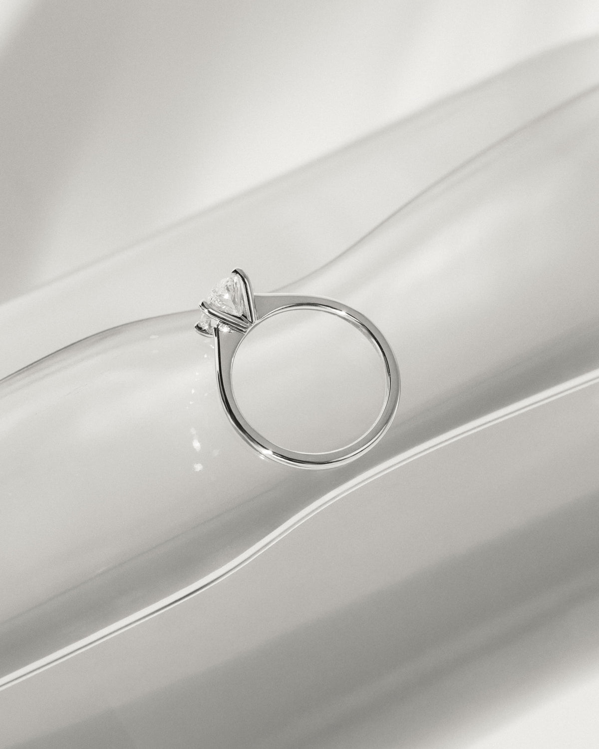 Emily - Oval Claw Solitaire with Pinched Tapered Band and Cathedral Low Setting Engagement Ring - Rose Gold