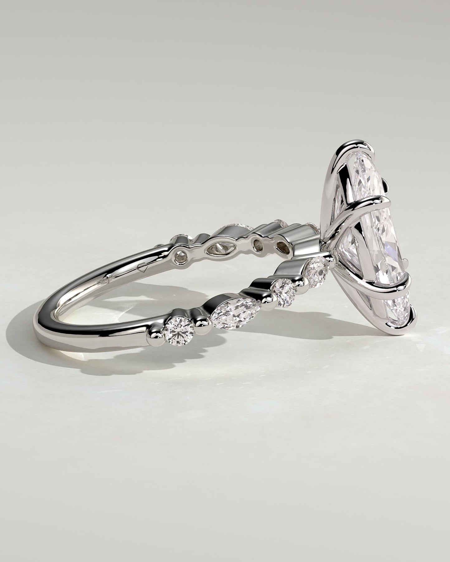 Beatrice - Marquise Claw Solitaire with Marquise and Round Accent Stones Engagement Ring - White Gold
