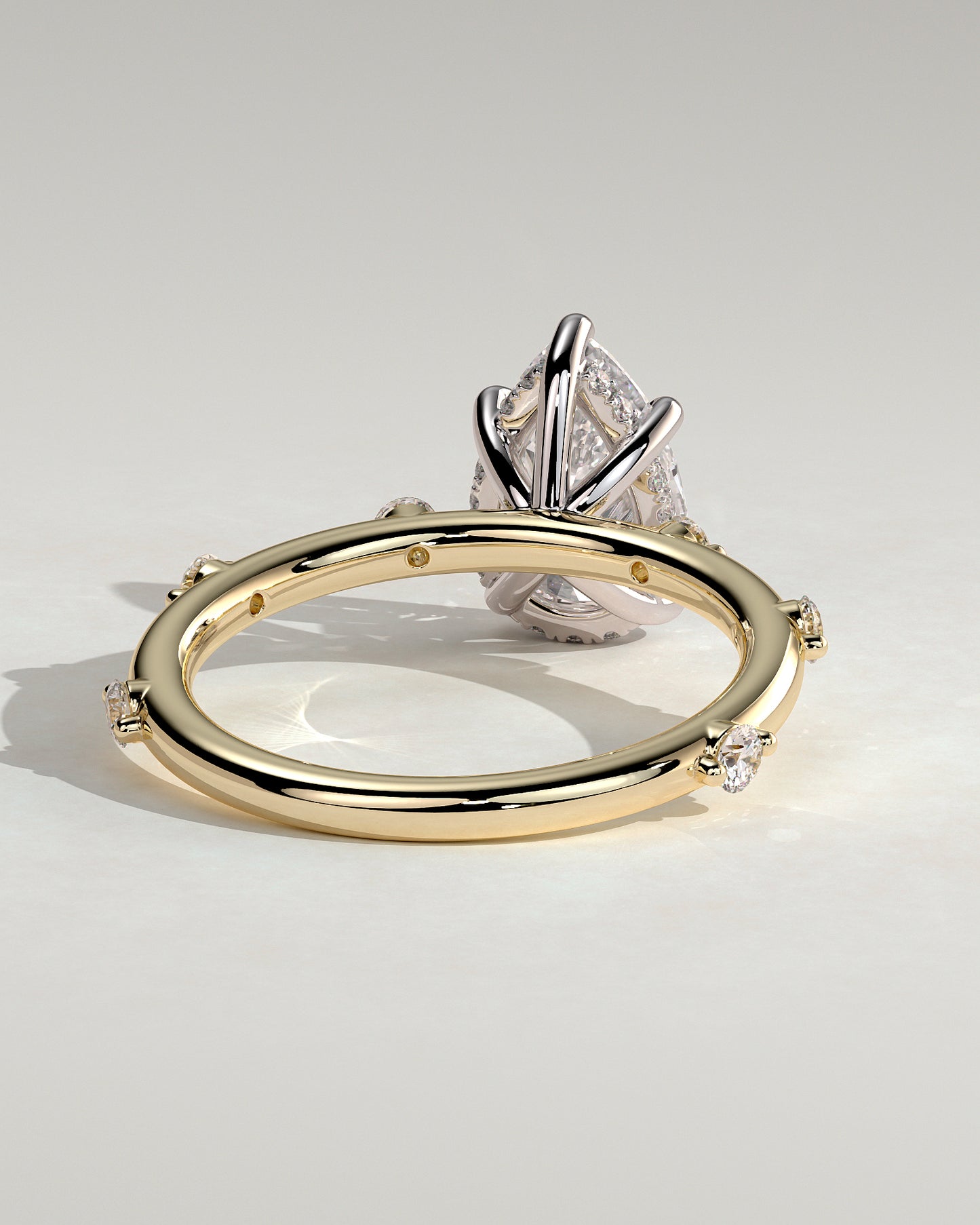 Amora - Pear Claw Solitaire with 6 Spaced Round Accent Stones and Hidden Halo Engagement Ring - Yellow Two-Tone - Yellow Two-Tone 2ct