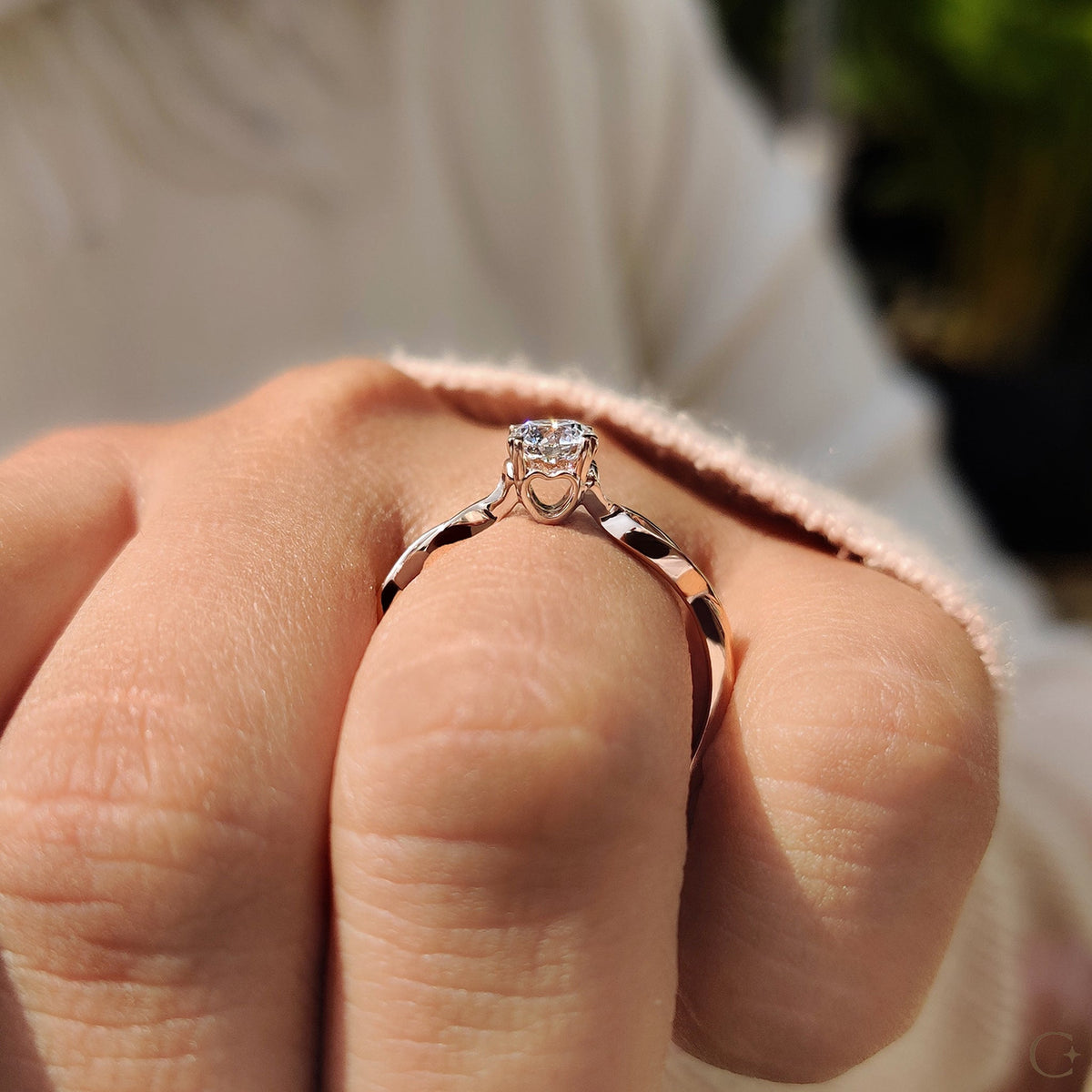Round Solitaire Engagement Ring With Twisted Shank Band