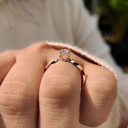 Round Solitaire Engagement Ring With Twisted Shank Band