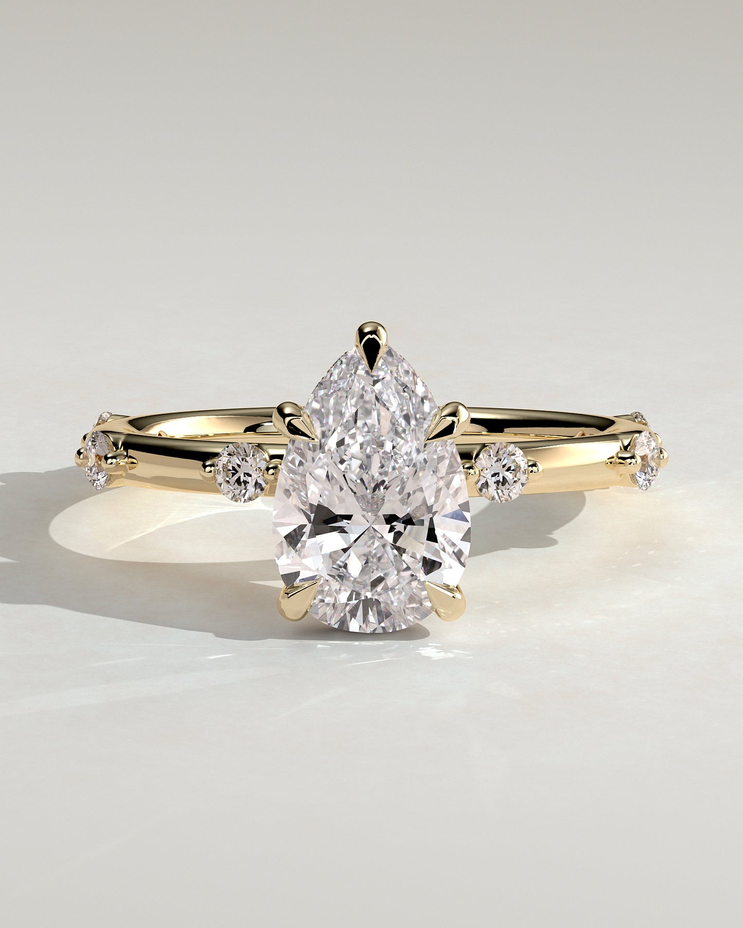 Amora - Pear Claw Solitaire with 6 Spaced Round Accent Stones and Hidden Halo Engagement Ring - Yellow Gold - Yellow Gold 2ct
