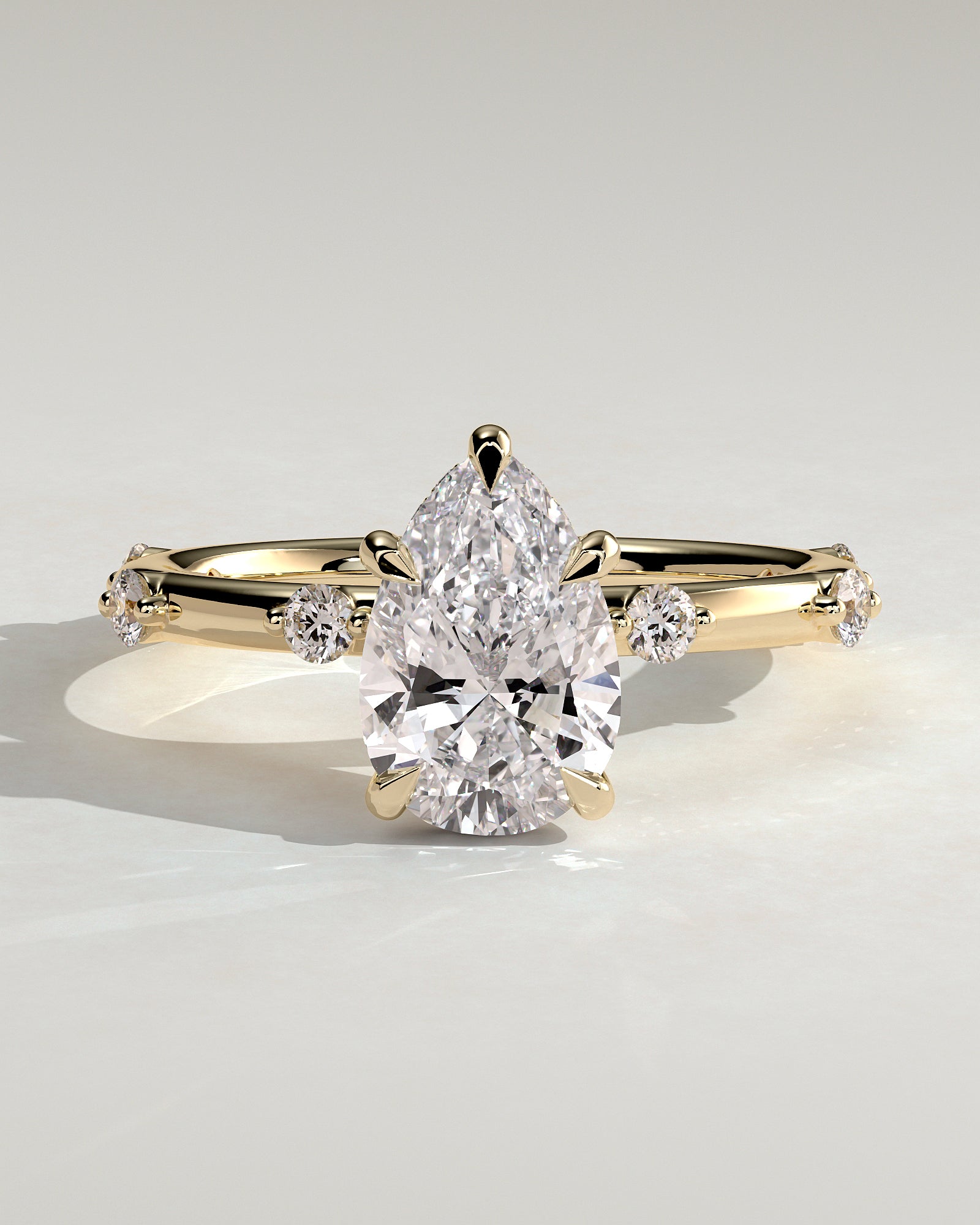 Amora - Pear Claw Solitaire with 6 Spaced Round Accent Stones and Hidden Halo Engagement Ring - Yellow Gold - Yellow Gold 2ct