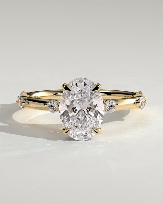 Elise - Oval Claw Solitaire with 6 Spaced Round Accent Stones and Hidden Halo Engagement Ring - Yellow Gold - Yellow Gold 2ct