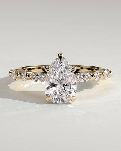Jacinta - Pear Claw Solitaire with Marquise and Round Accent Stones Engagement Ring - Yellow Gold