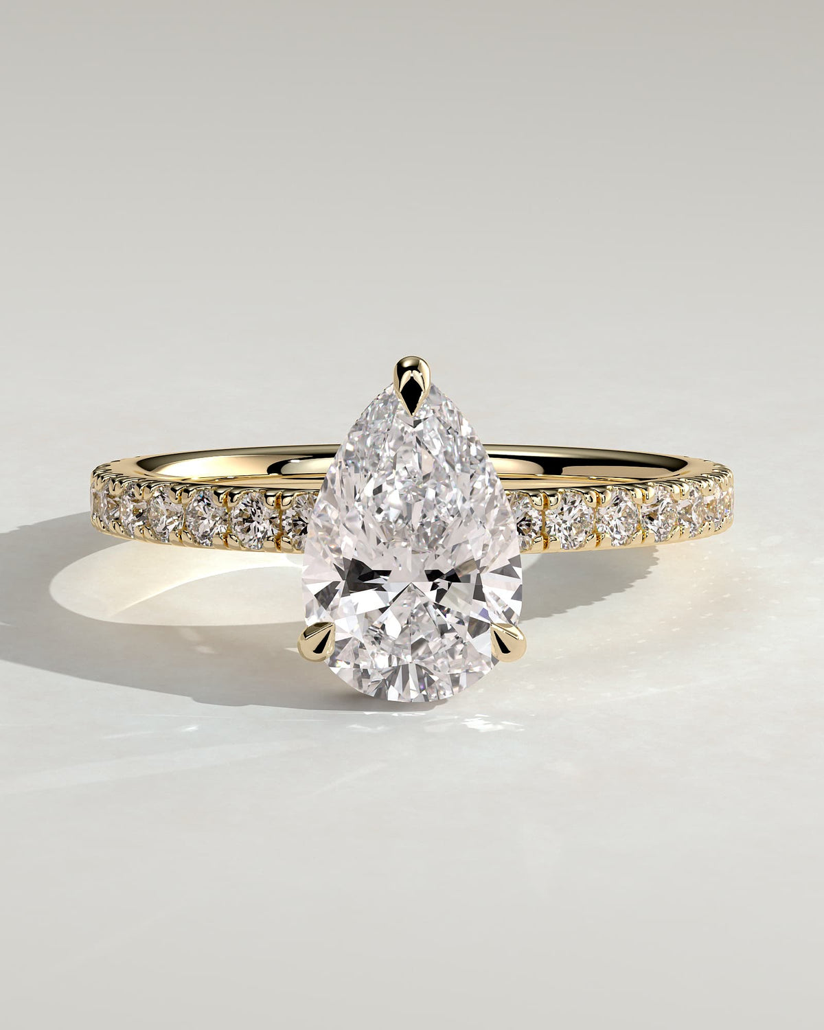 Keira - Pear Claw Solitaire with Wrap Around Hidden Halo and Pave Band Engagement Ring - Yellow Gold