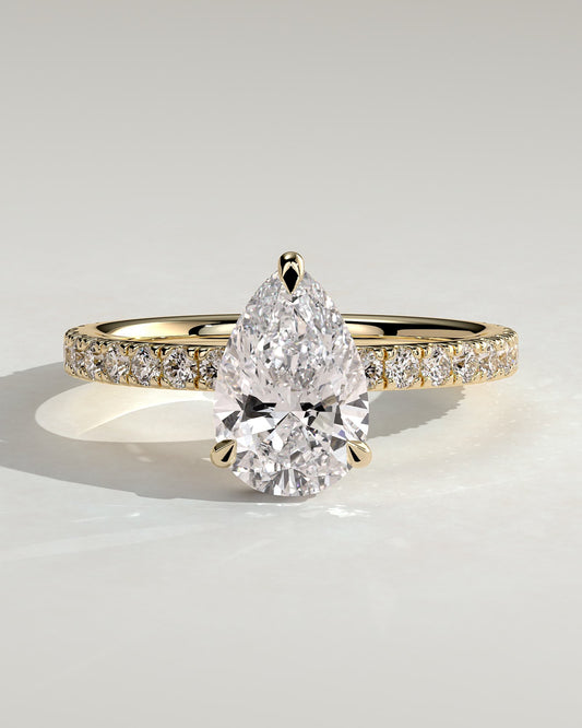 Keira - Pear Claw Solitaire with Wrap Around Hidden Halo and Pave Band Engagement Ring - Yellow Gold
