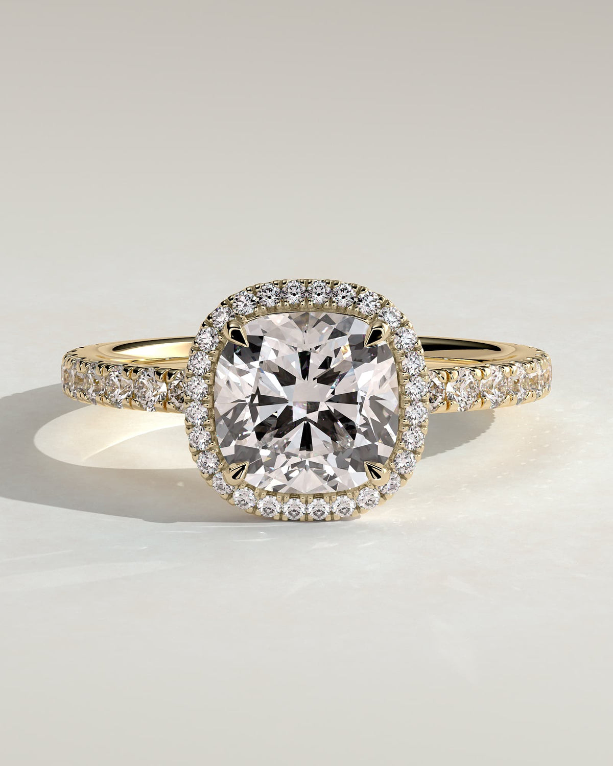 Suzana - Cushion Claw Solitaire with Halo and Pave Band Engagement Ring - Yellow Gold