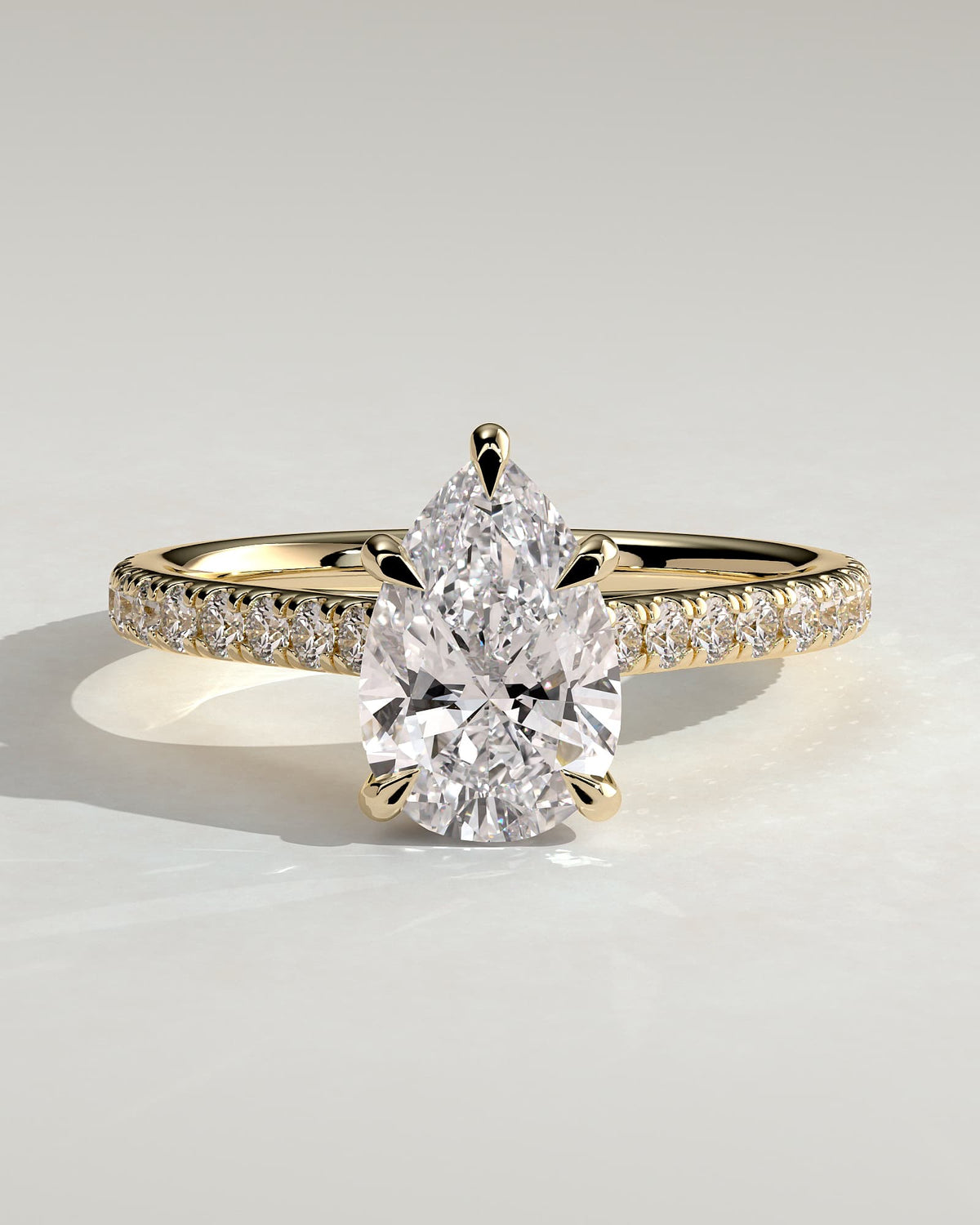 Katrina - Pear Claw Solitaire with Hidden Halo, Pave Band and Cathedral High Setting Engagement Ring - Yellow Gold