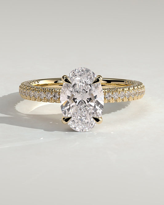 Penelope - Oval Claw Solitaire with Hidden Halo and Triple Pave Band Engagement Ring - Yellow Gold