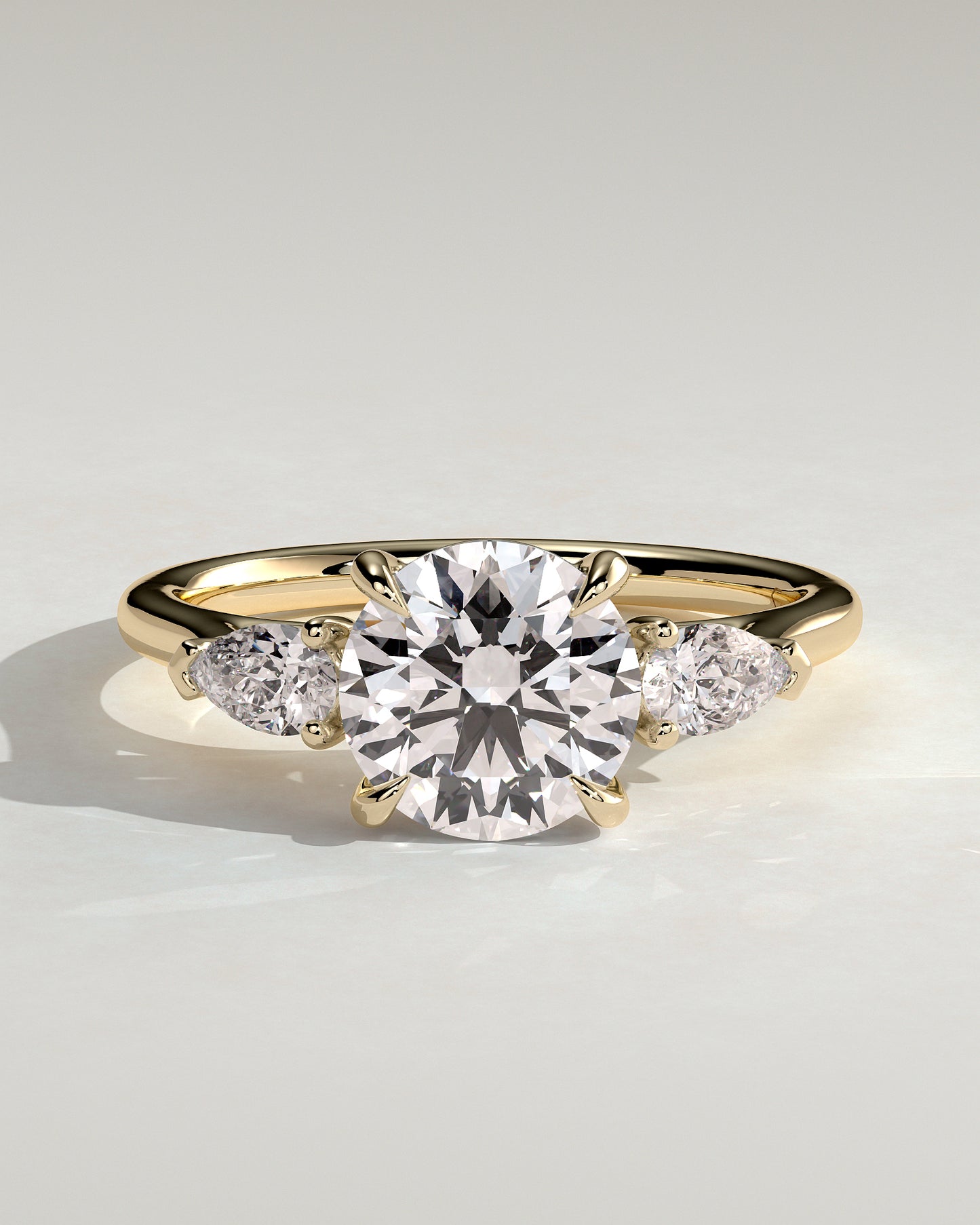 Arya - Round Claw Trilogy with Pear Side Stones and Cathedral Setting Engagement Ring - Yellow Gold - Yellow Gold 2ct
