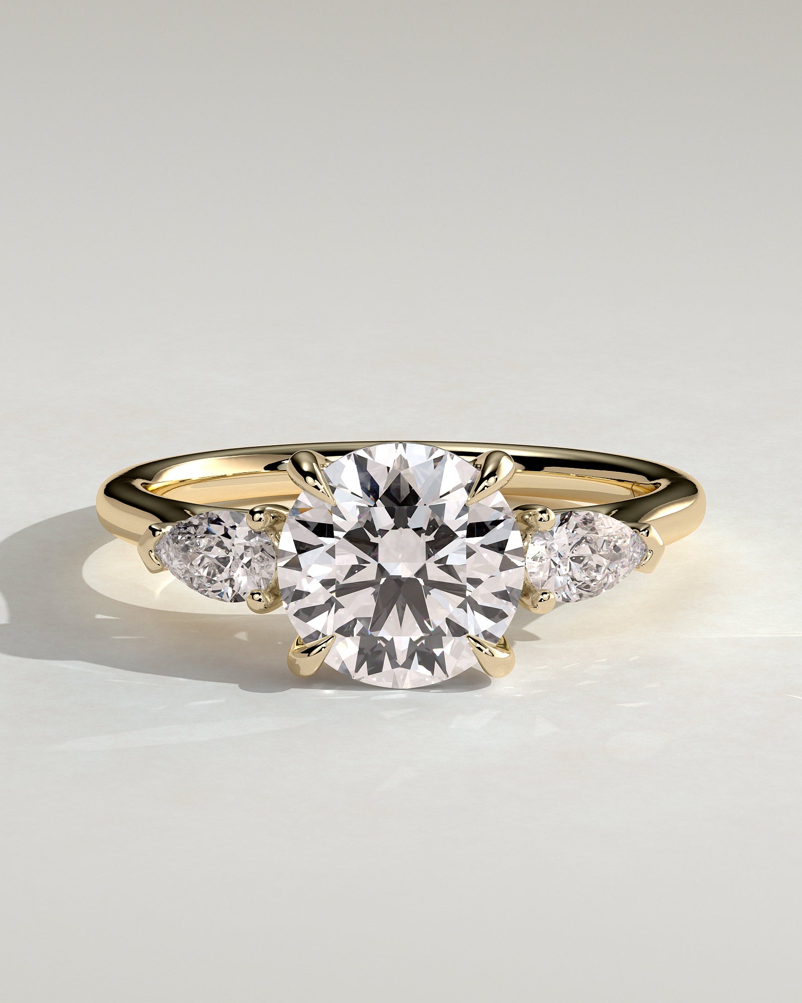 Arya - Round Claw Trilogy with Pear Side Stones and Cathedral Setting Engagement Ring - Yellow Gold - Yellow Gold 2ct
