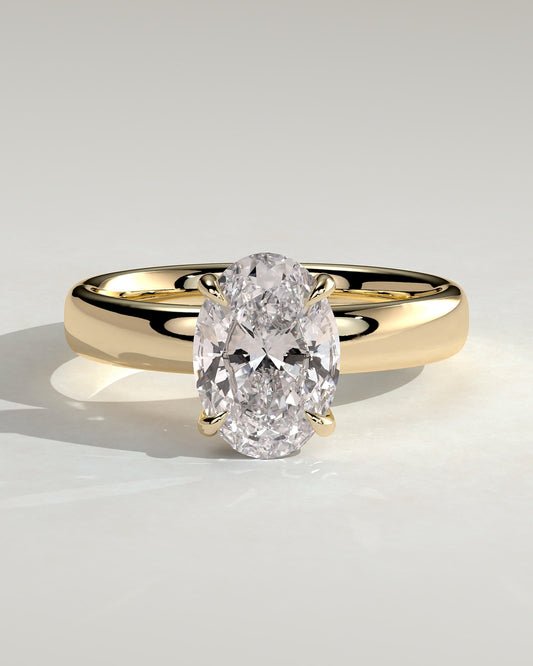 Bronte - Oval Claw Solitaire with Cigar Band and Hidden Halo Engagement Ring - Yellow Gold