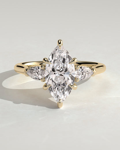 Chantelle - Marquise Claw Trilogy with Pear Side Stones and Cathedral Setting Engagement Ring - Yellow Gold