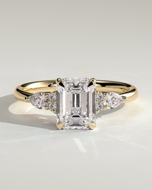 Raleigh - Emerald Claw Solitaire with Pear Accents and Round Shoulder Stones Engagement Ring - Yellow Gold