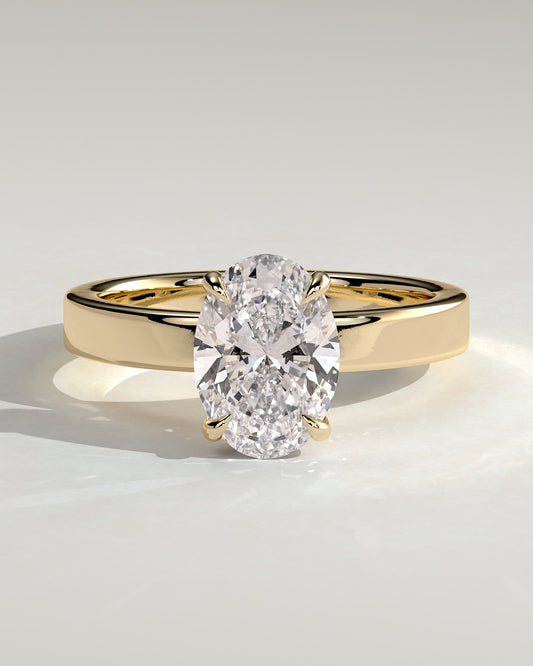 Nikita - Oval Claw Solitaire with Flat Cigar Band and Hidden Halo Engagement Ring - Yellow Gold