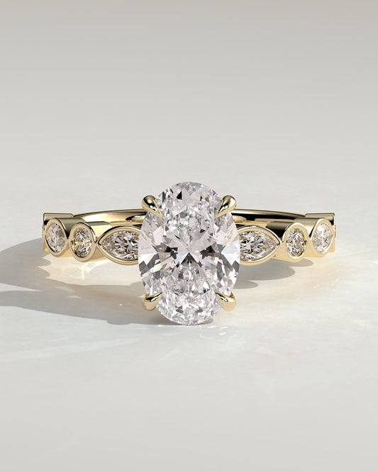 Rhiannon - Oval Claw Solitaire with Round-Marquise Bezel Accent Stones Engagement Ring - Yellow Gold