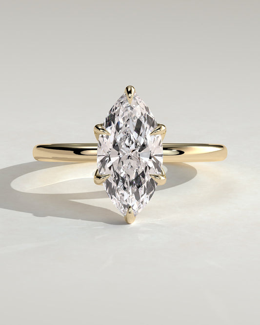 Robin - Marquise Claw Solitaire with Petal Gallery and Accent Leaf Detail Engagement Ring - Yellow Gold
