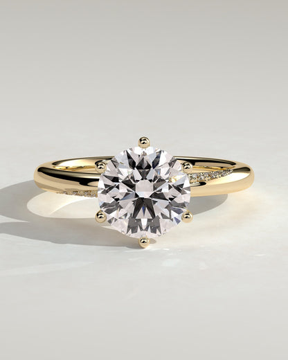 Mahlia - Round Claw Solitaire with Sweeping Micropav?Band Engagement Ring - Yellow Gold