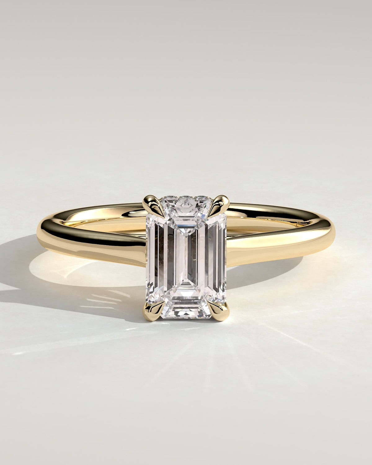 Jane - Emerald Claw Solitaire with Hidden Halo and Cathedral High Setting Engagement Ring - Yellow Gold