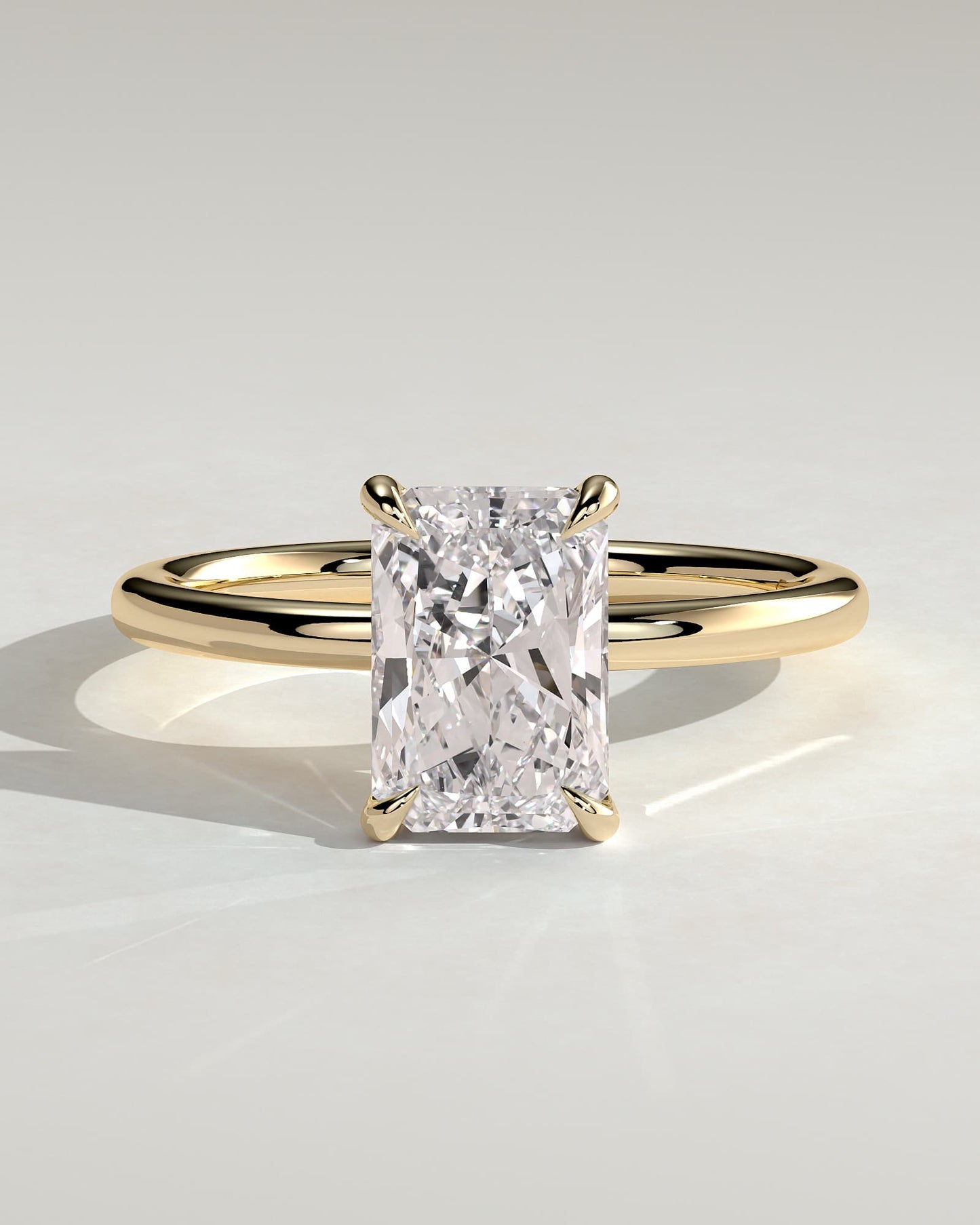 Judy - Radiant Claw Solitaire Engagement Ring - Yellow Gold
