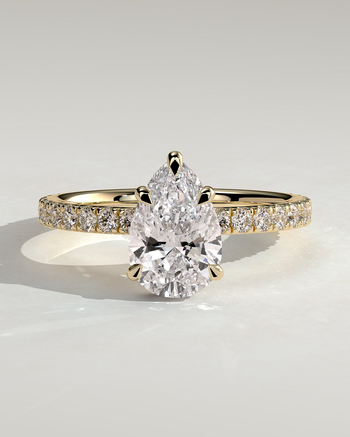 Jordanna - Pear Claw Solitaire with Wrap Around Hidden Halo and Pave Band Engagement Ring - Yellow Gold