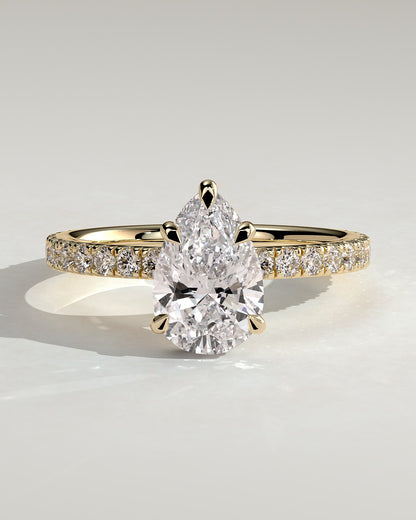 Jordanna - Pear Claw Solitaire with Wrap Around Hidden Halo and Pave Band Engagement Ring - Yellow Gold