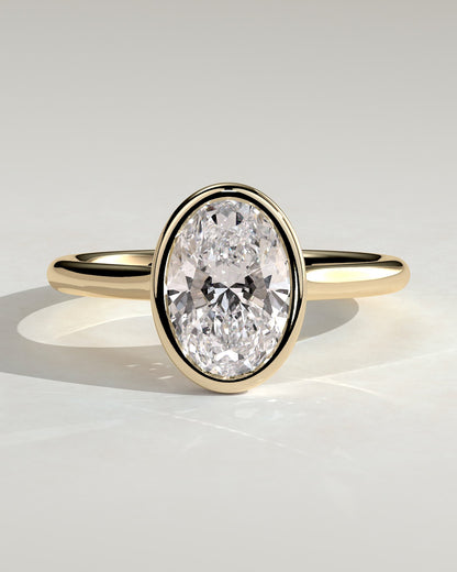 Daphne - Oval Bezel Solitaire with Cathedral High Setting Engagement Ring - Yellow Gold