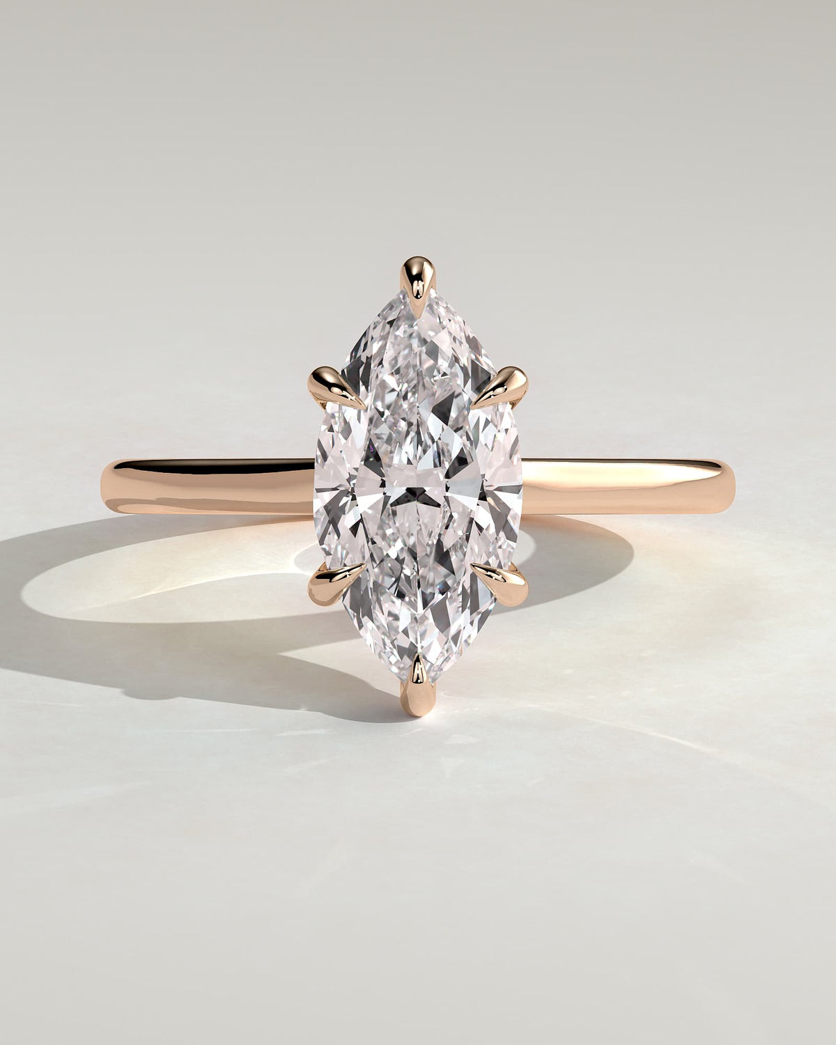 Jenna - Marquise Claw Solitaire with Hidden Halo and Cathedral High Setting Engagement Ring - Rose Gold