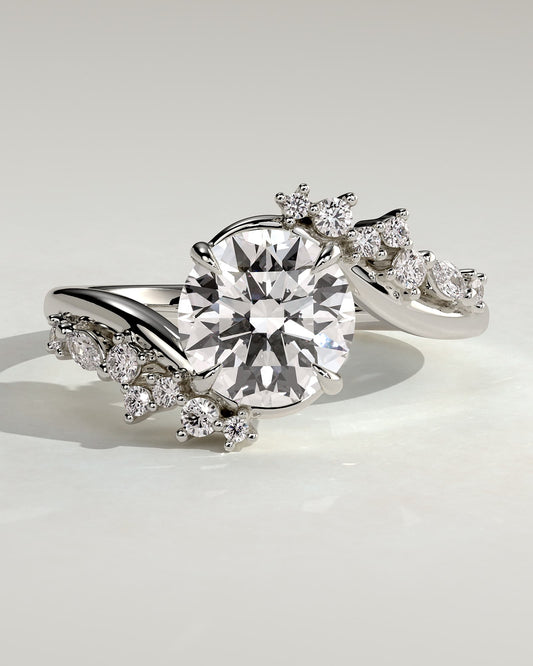 Lorena - Round Claw Solitaire with Bypass Band and Clustered Round-Marquise Accent Stones Engagement Ring - Platinum