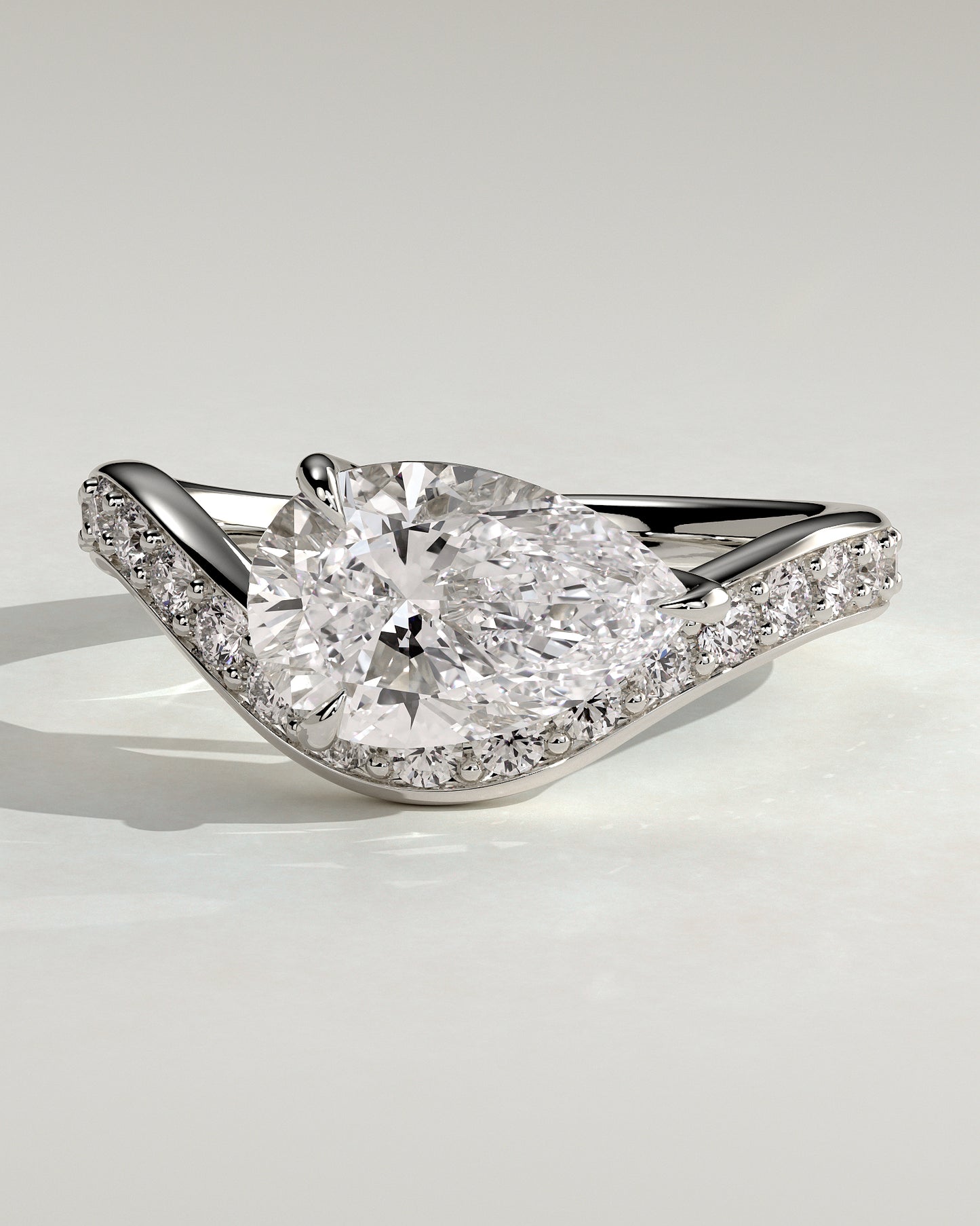 Eliza - Pear Claw Solitaire with Bead Set Pave Wave Band and East West Setting Engagement Ring - Platinum - White Gold / Platinum 2ct