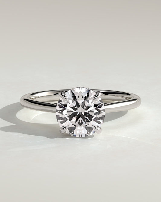 Laura - Round Claw Solitaire with Hidden Halo, Tapered Band and Cathedral High Setting Engagement Ring - Platinum