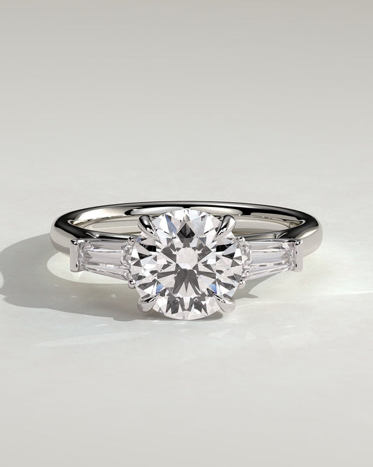 Marina - Round Claw Trilogy with Tapered Baguette Side Stones and Cathedral Setting Engagement Ring - White Gold