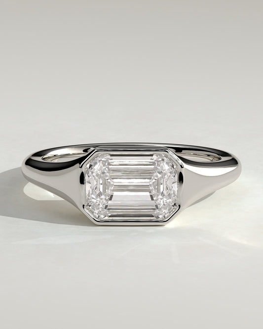 Montanah - Emerald East West Bezel Solitaire with Signet Band Engagement Ring - White Gold