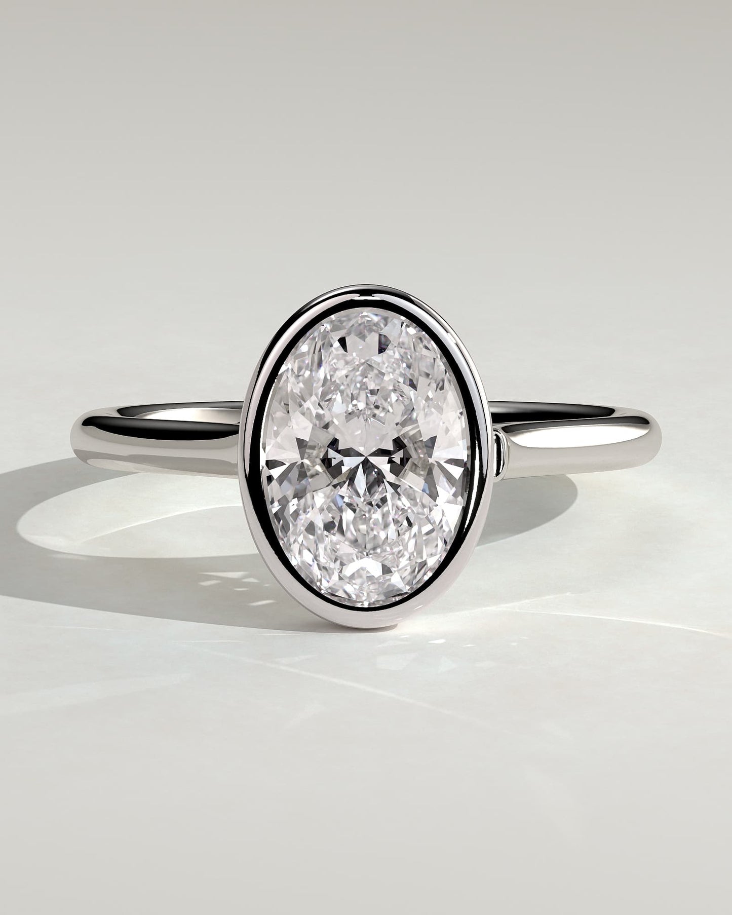 Lexie - Statement Oval Bezel Solitaire with Open Cathedral High Setting Engagement Ring - White Gold