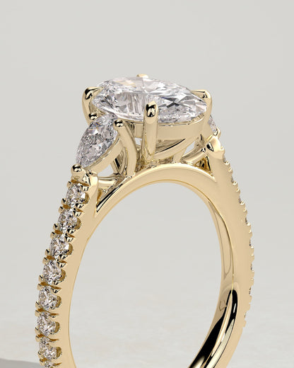 Arabella - Oval Claw Trilogy with Pear Side Stones and Pave Band Engagement Ring - Yellow Gold