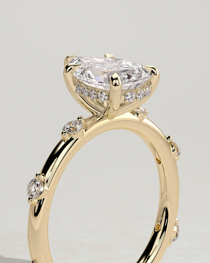 Amora - Pear Claw Solitaire with 6 Spaced Round Accent Stones and Hidden Halo Engagement Ring - Yellow Gold