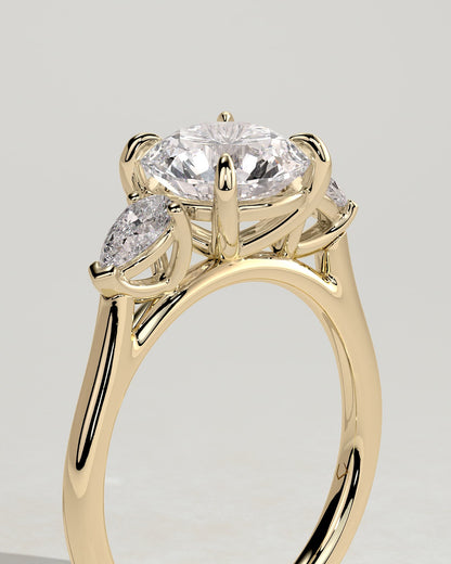 Arya - Round Claw Trilogy with Pear Side Stones and Cathedral Setting Engagement Ring - Yellow Gold