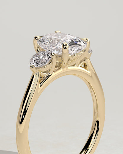 Charmaine - Elongated Cushion Claw Trilogy with Round Side Stones and Lily Detail Engagement Ring - Yellow Gold