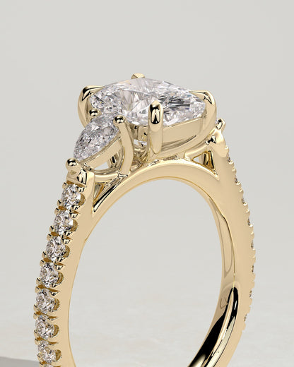 Bree - Elongated Cushion Claw Trilogy with Pear Side Stones and Pave Band Engagement Ring - Yellow Gold