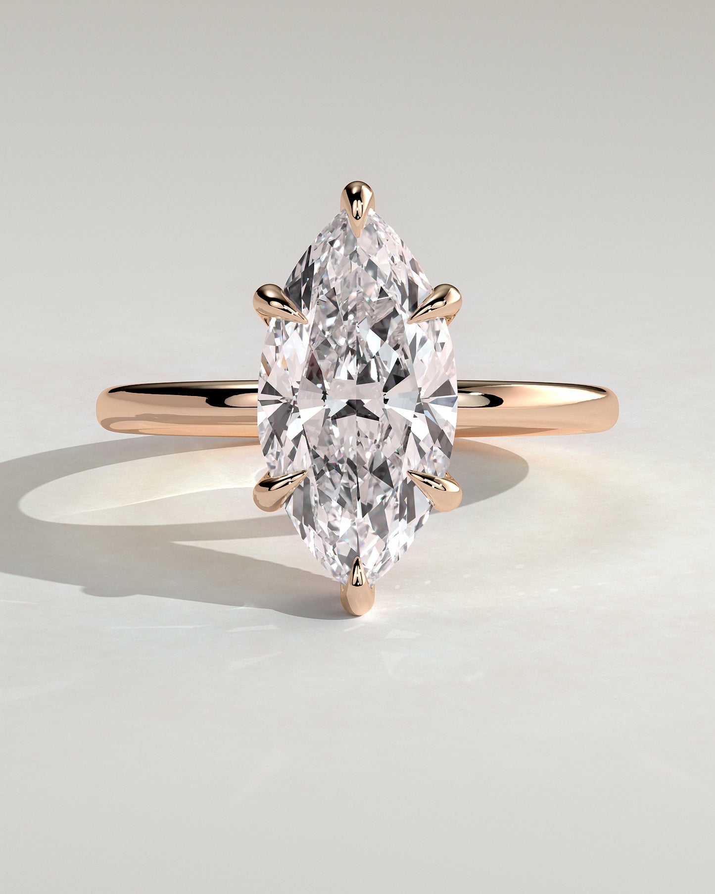 Claire - Marquise Claw Solitaire with Wrap Around Hidden Halo Engagement Ring - Rose Gold